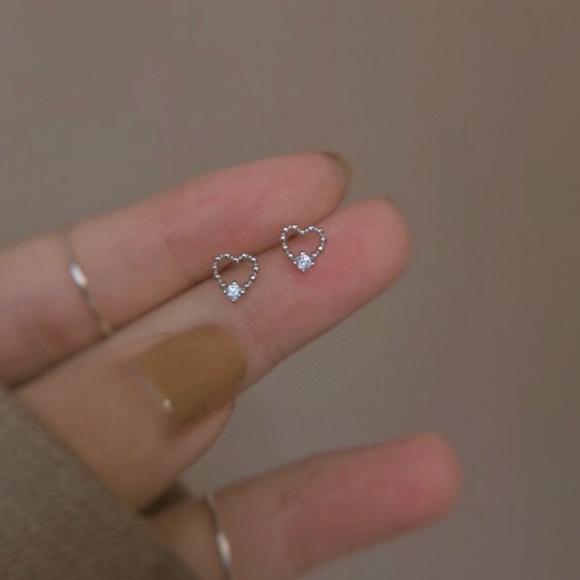 Sterling Silver 'Gaëlle' Studded Hollow Heart and Simulated Diamond Earrings - Picture 1 of 3